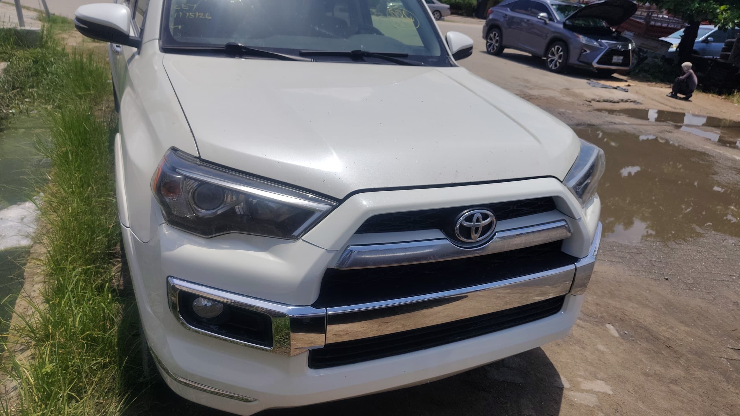 Toyota 4Runner in white — front view with chrome grille, available at Sabfatex Autos, Port Harcourt